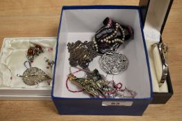 A collection of costume jewellery, including an iridescent enamelled butterfly brooch, a white metal