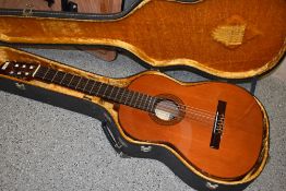 A vintage Taurus classical guitar, model 49, with hard case