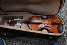 A modern violin, labelled Max Bruch Stradivarius copy, with case and bow