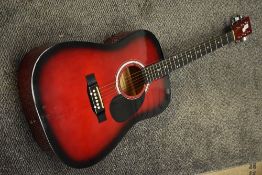 A Martin Smith acoustic guitar, with gig bag