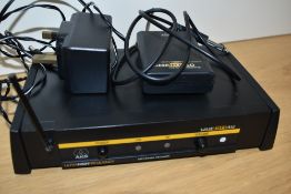 An AKG UHF/SR40 wireless guitar transmitter
