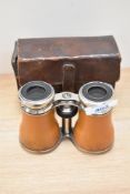 A cased pair of Lumiere, Paris opera glasses