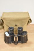 A pair of H Hughes, London Paget Prism binoculars No19323 in webbing case