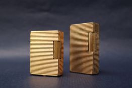An S T Dupont gold plated lighter, 5.