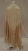A silk piano shawl, the champagne ground profusely embroidered with grapes & vines,