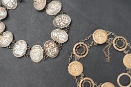 A Chinese yellow metal bangle with circular links and characters, marked K14, approximately 7.