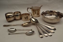 A George V silver cylindrical mustard pot and cover with a scrolling handle, Sheffield, 1923,