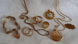 Two pairs of 9ct gold hoop earrings together with a 9ct gold locket on a chain,