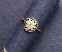 An 18ct yellow gold and platinum ring,