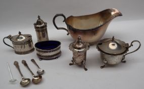 A George VI silver sauce boat of oval form with line decorated rim and foot, Sheffield, 1939,