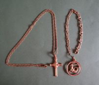 An 18ct yellow gold cross on an 18ct yellow gold chain,