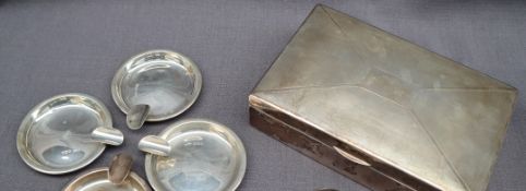 A George V silver cigarette box of rectangular form with engine turned decoration, 17 x 11cm,