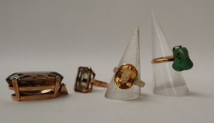 An 18ct gold citrine set dress ring set with a large oval faceted citrine, size P 1/2,