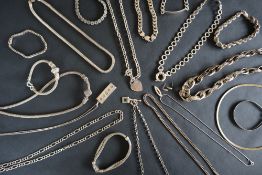 A silver ingot pendant together with a collection of silver jewellery including, necklaces,