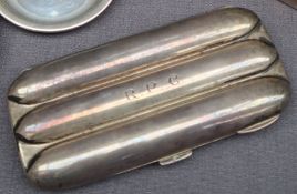 A George VI silver three division cigar case, initialled 