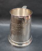An Elizabeth II silver tankard of tapering cylindrical form, with a scrolling handle,