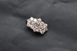 A diamond cluster ring,