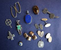 Three pairs of silver cufflinks together with silver hoop earrings,