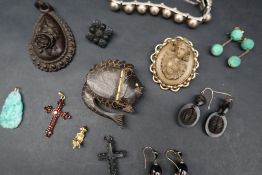 A Lava cameo of a maiden in a gilt metal mount together a horn snuff box in the form of a fish,