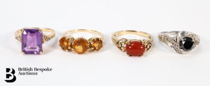 Four 9ct Gold Rings
