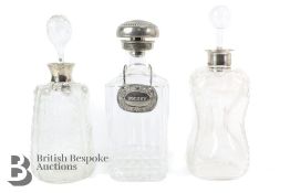 Three Cut-Glass Decanters