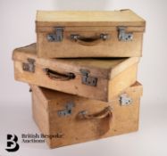 Three Vellum Suitcases