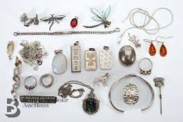 Two Credit Suisse 20 gms Silver Pendants