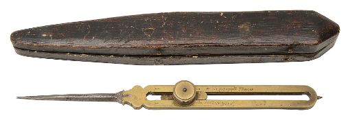 A pair of brass proportional dividers