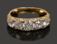 A diamond five stone ring