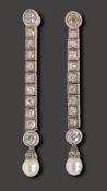 A pair of diamond and pearl ear pendants