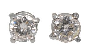 A pair of diamond ear studs