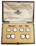 A set of mother of pearl and yellow gold cufflinks and dress studs
