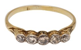 A diamond five stone ring