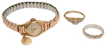 A 18ct white gold textured ring, lady's wristwatch, and diamond ring