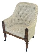 A George IV mahogany and upholstered tub library armchair