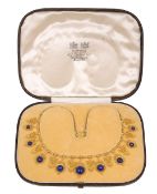A mid 19th century Etruscan Revival yellow gold and lapis lazuli fringe necklace