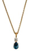A blue topaz and diamond pendant