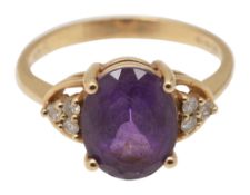 An amethyst and diamond-set ring