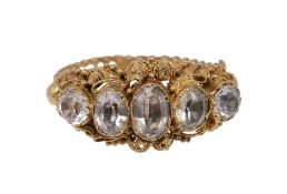 An early 19th century yellow gold and white stone ring