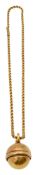 A rope twist gold neck chain with Singers Patent compass swivel ball fob