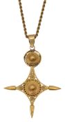 A gold African southern cross pendant