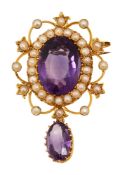 An oval amethyst pendant/brooch