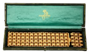 A stylish wide 14ct yellow gold cuff bracelet