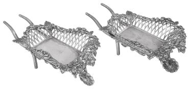 A pair of Edwardian novelty silver wheelbarrow bonbon dishes
