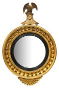 A Regency giltwood convex mirror