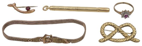 A toothpick and other jewellery