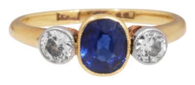 A sapphire and diamond three stone ring,