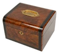 An early Victorian simulated burr walnut dressing box