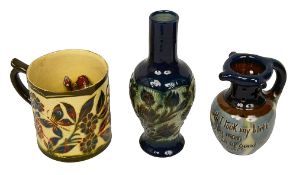 A Lauder of Barum pottery frog mug and two pottery pieces (3)