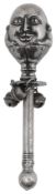 A novelty electroplated Humpty-Dumpty rattle